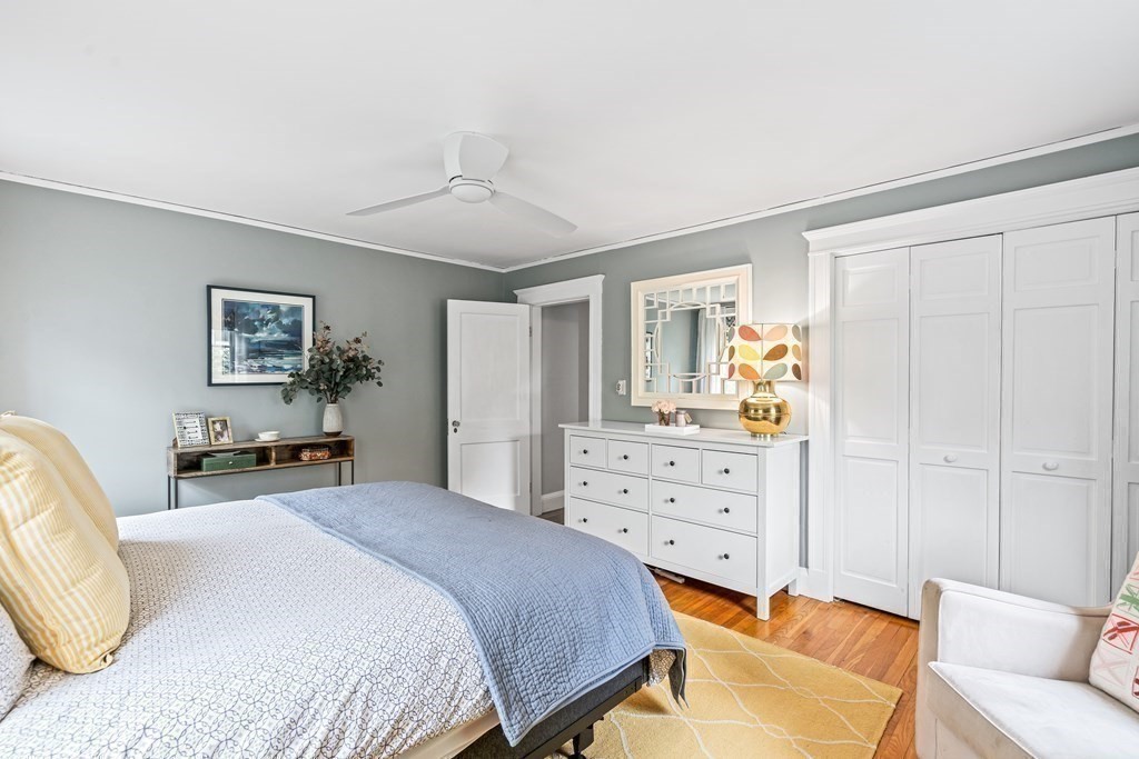 229 Weston Road Wellesley, MA 02482 - Photo 14 of 24 a bedroom with a bed and furniture