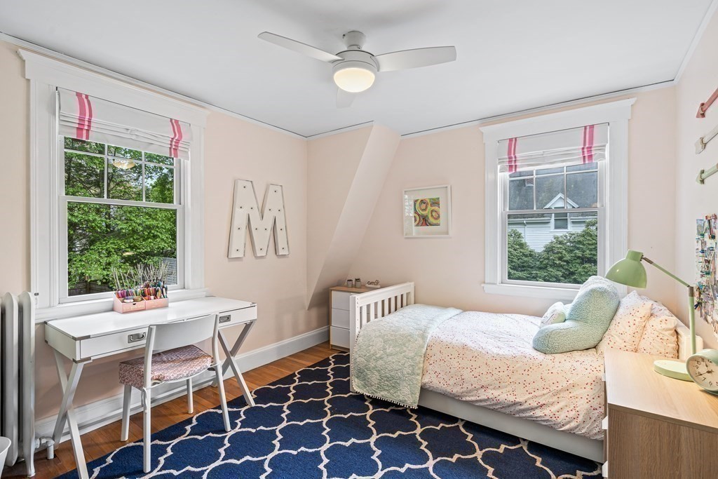 229 Weston Road Wellesley, MA 02482 - Photo 15 of 24 a bedroom with a bed and a window