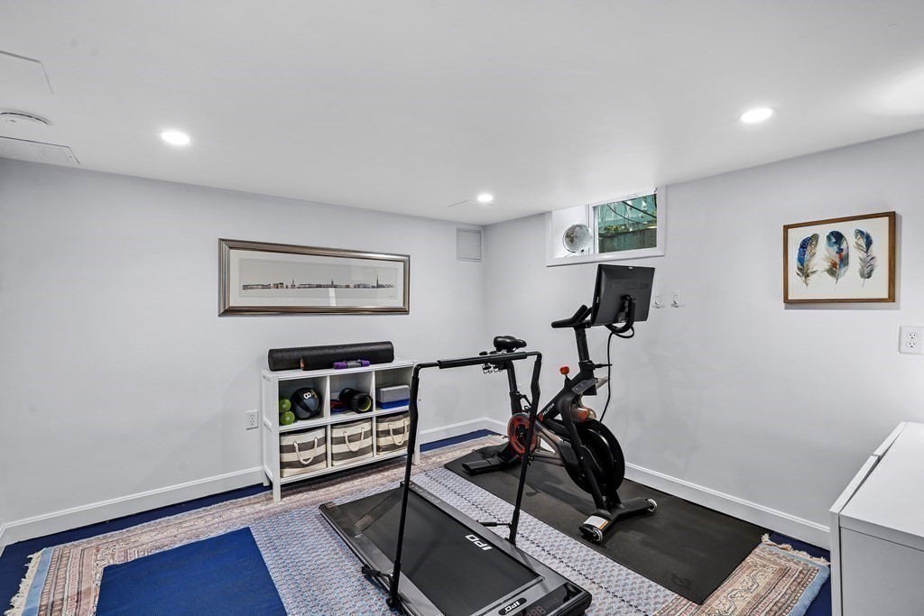 229 Weston Road Wellesley, MA 02482 - Photo 20 of 24 a view of a room with gym equipment