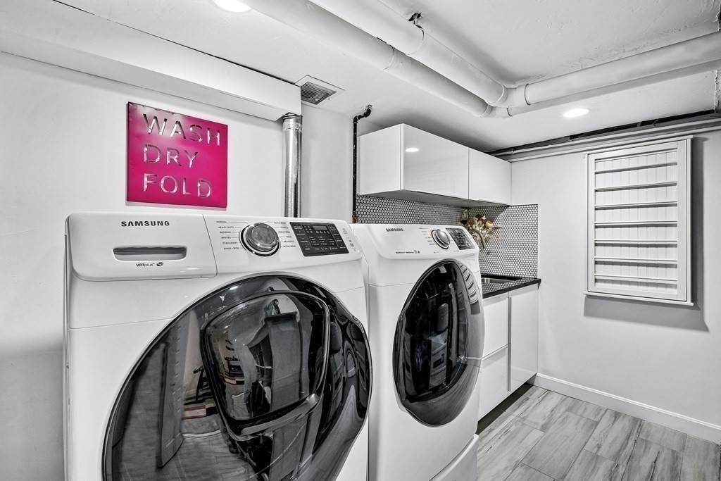 229 Weston Road Wellesley, MA 02482 - Photo 21 of 24 a utility room with dryer and washer