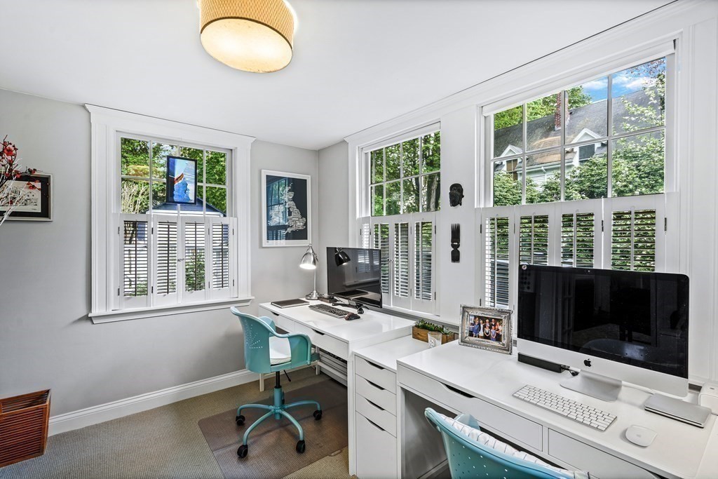 229 Weston Road Wellesley, MA 02482 - Photo 5 of 24 a view of workspace with wooden floor windows wardrobe