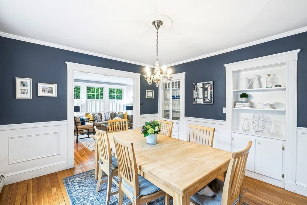 229 Weston Road Wellesley, MA 02482 - Photo 6 of 24 a view of a dining room with furniture window and wooden floor