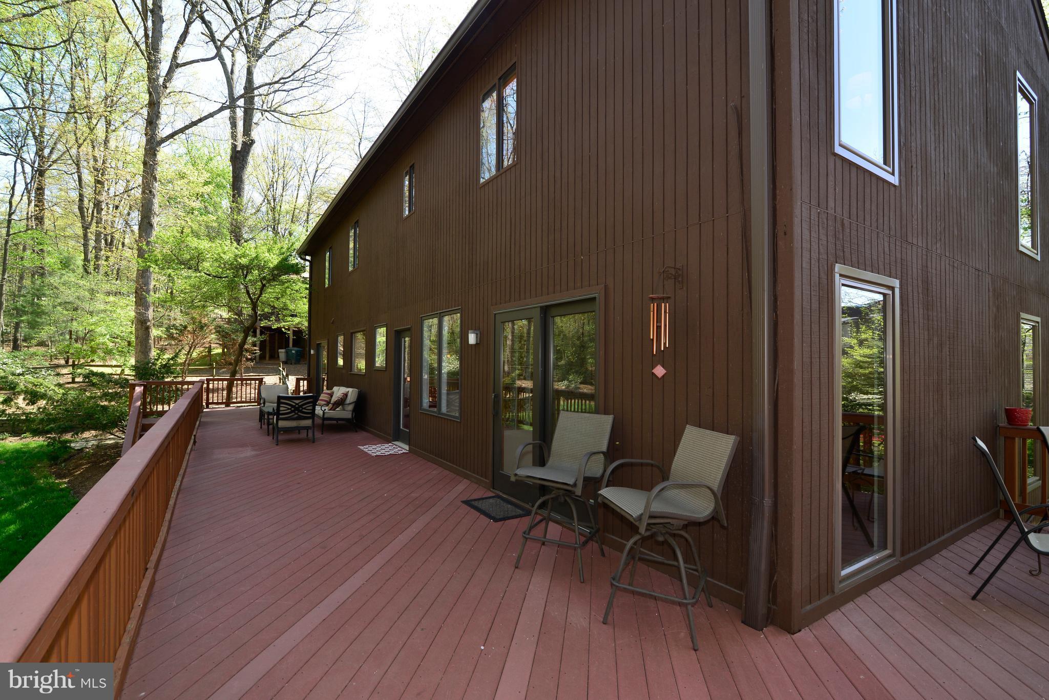 2203 Spinnaker Court Reston, VA 20191 - Photo 13 of 30 a view of a house with backyard and sitting area