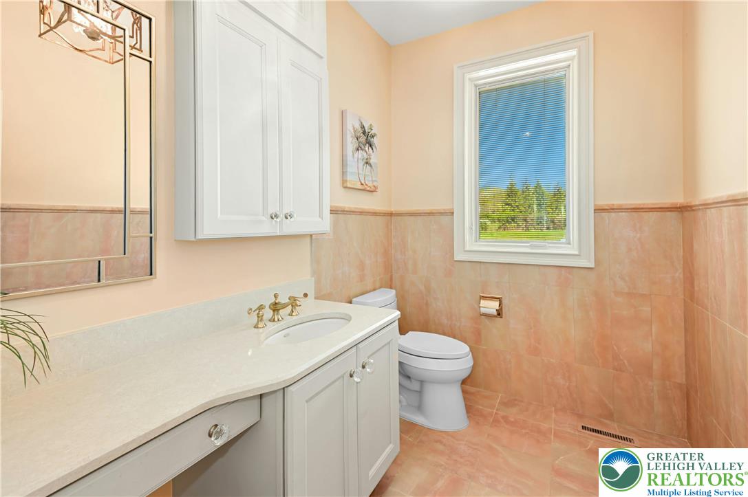 3200 Creamery Road New Hope, PA 18938 - Photo 20 of 42 a bathroom with a sink toilet and vanity