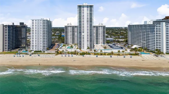 a view of a city with tall buildings