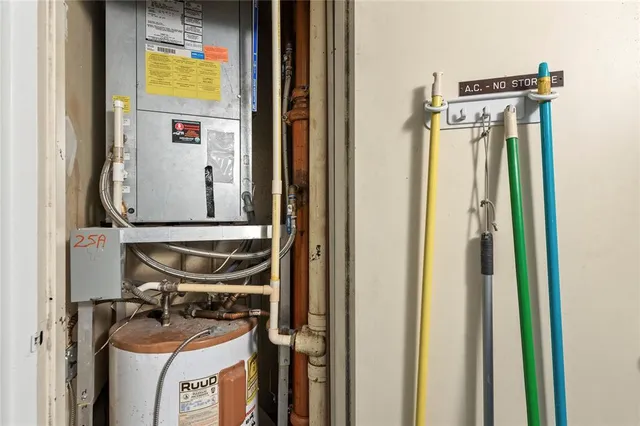 a living room with patio furniture and a garden