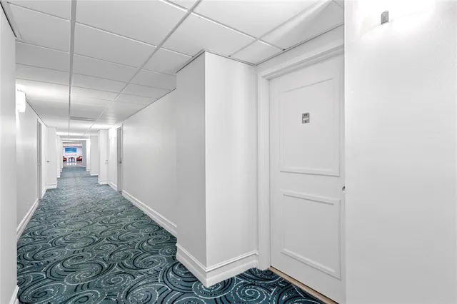 a view of swimming pool with outdoor seating and a pathway