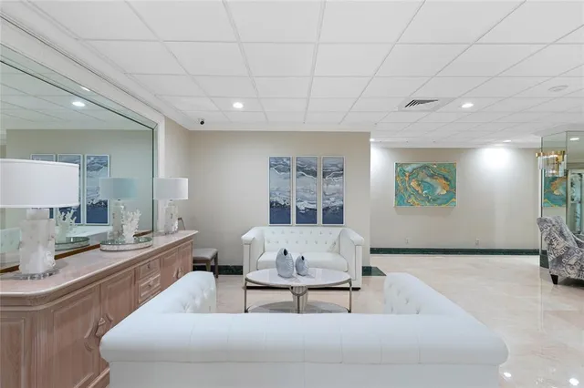 a front view of a building with glass windows