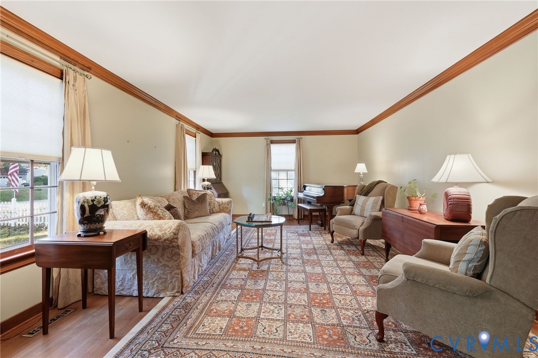 8216 Chainmaile Road North Chesterfield, VA 23235 - Photo 13 of 36 a living room with furniture or couch and a large window