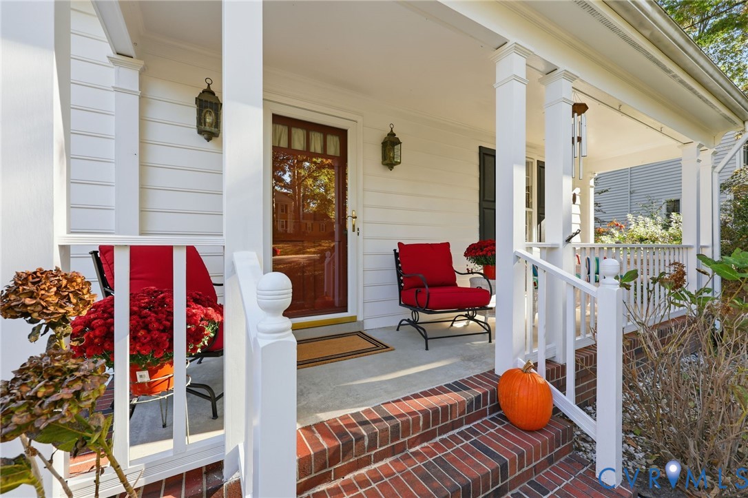 8216 Chainmaile Road North Chesterfield, VA 23235 - Photo 7 of 36 a view of living room filled with furniture and rug
