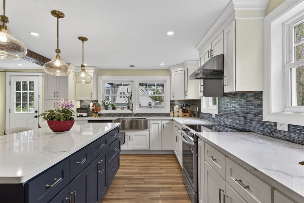 229 Parkerville Road Southborough, MA 01772 - Photo 35 of 38 a kitchen with a sink and cabinets