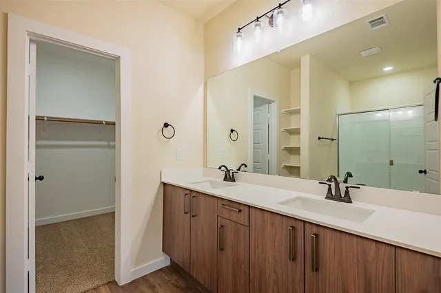 a bathroom with a shower and a toilet
