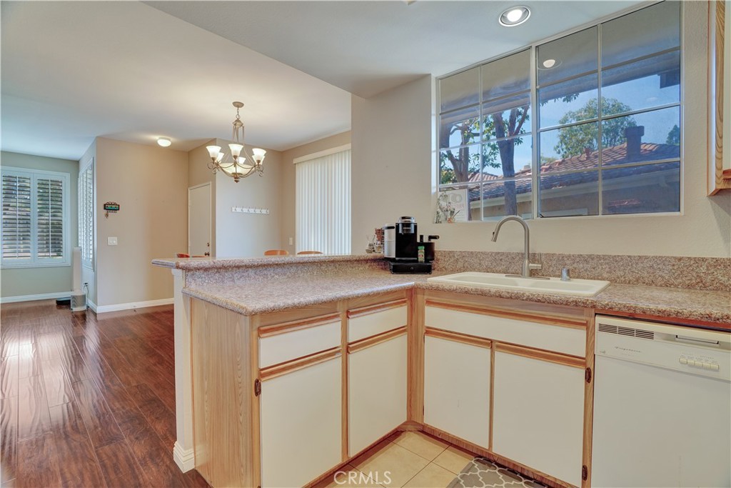 234 Gallery Tustin, CA 92782 - Photo 9 of 46 a bathroom with a sink and a mirror