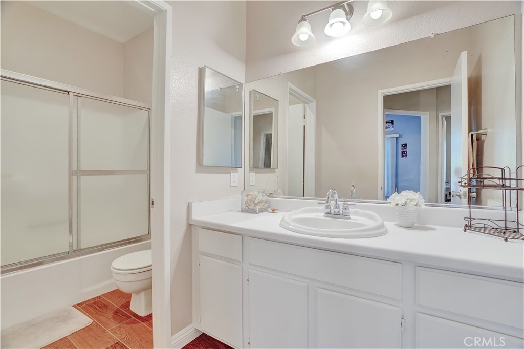 234 Gallery Tustin, CA 92782 - Photo 16 of 46 a bathroom with a sink and a mirror