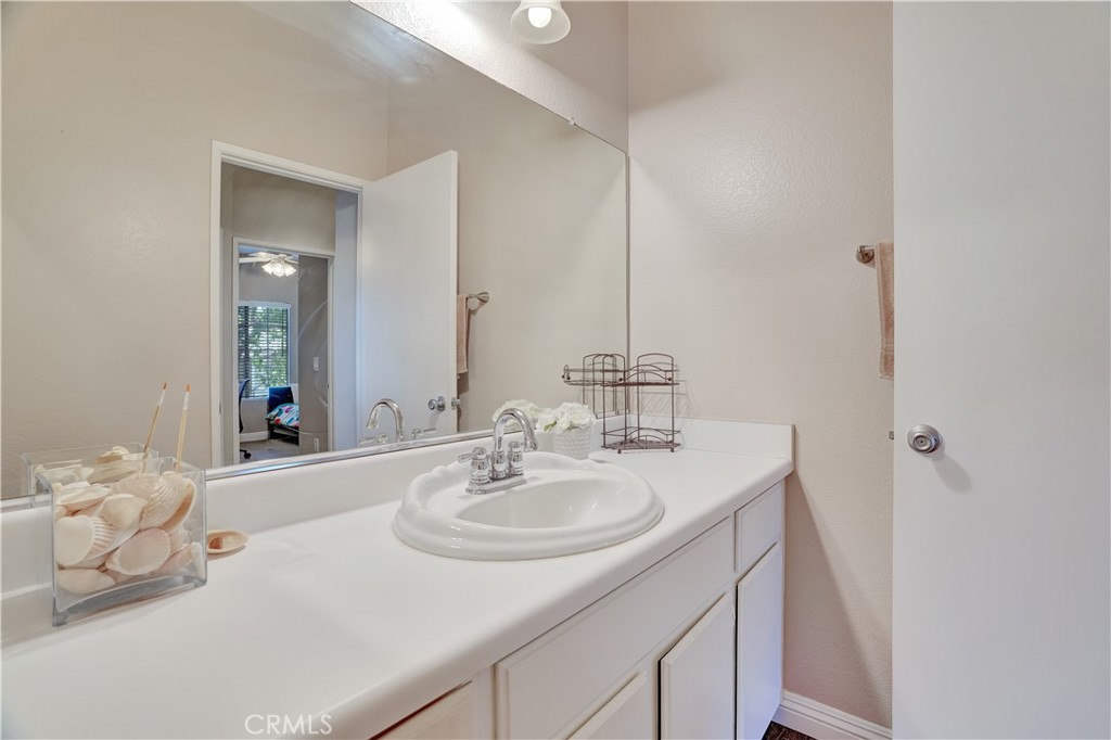 234 Gallery Tustin, CA 92782 - Photo 17 of 46 a bathroom with a sink and a mirror
