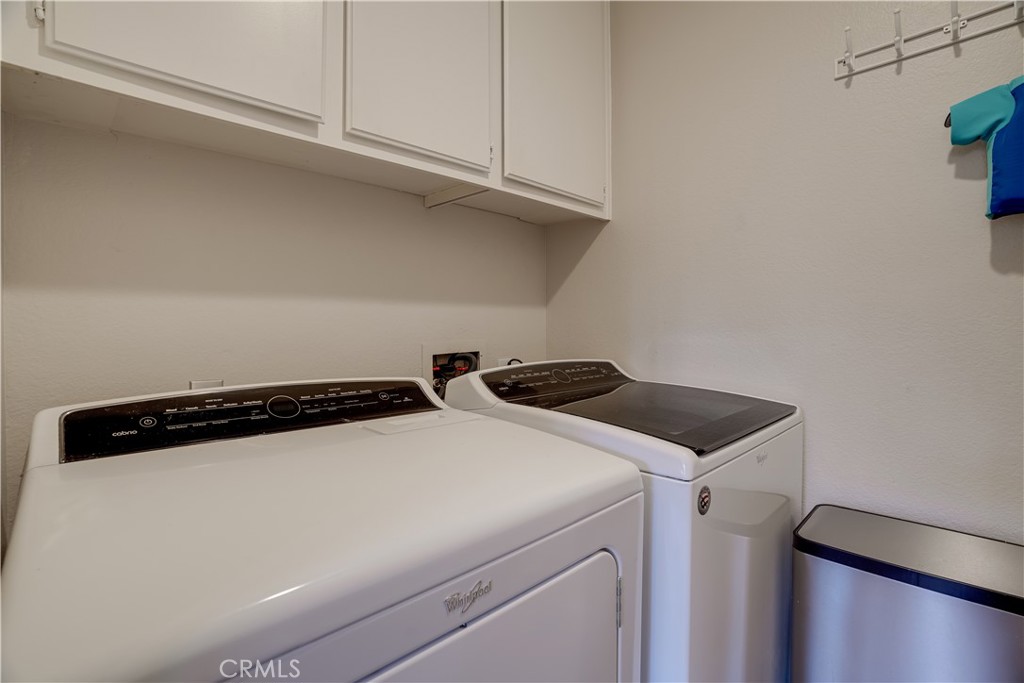 234 Gallery Tustin, CA 92782 - Photo 23 of 46 a utility room with dryer and washer