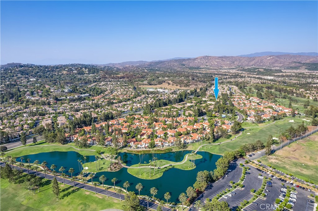 234 Gallery Tustin, CA 92782 - Photo 38 of 46 an aerial view of a houses with a lake