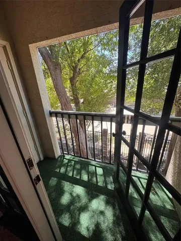 a bathroom with a double vanity sink a mirror and a bathtub