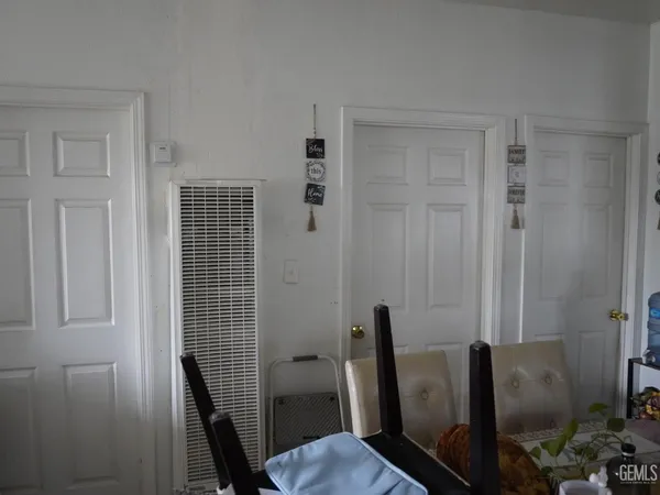 a view of a hallway with seating area