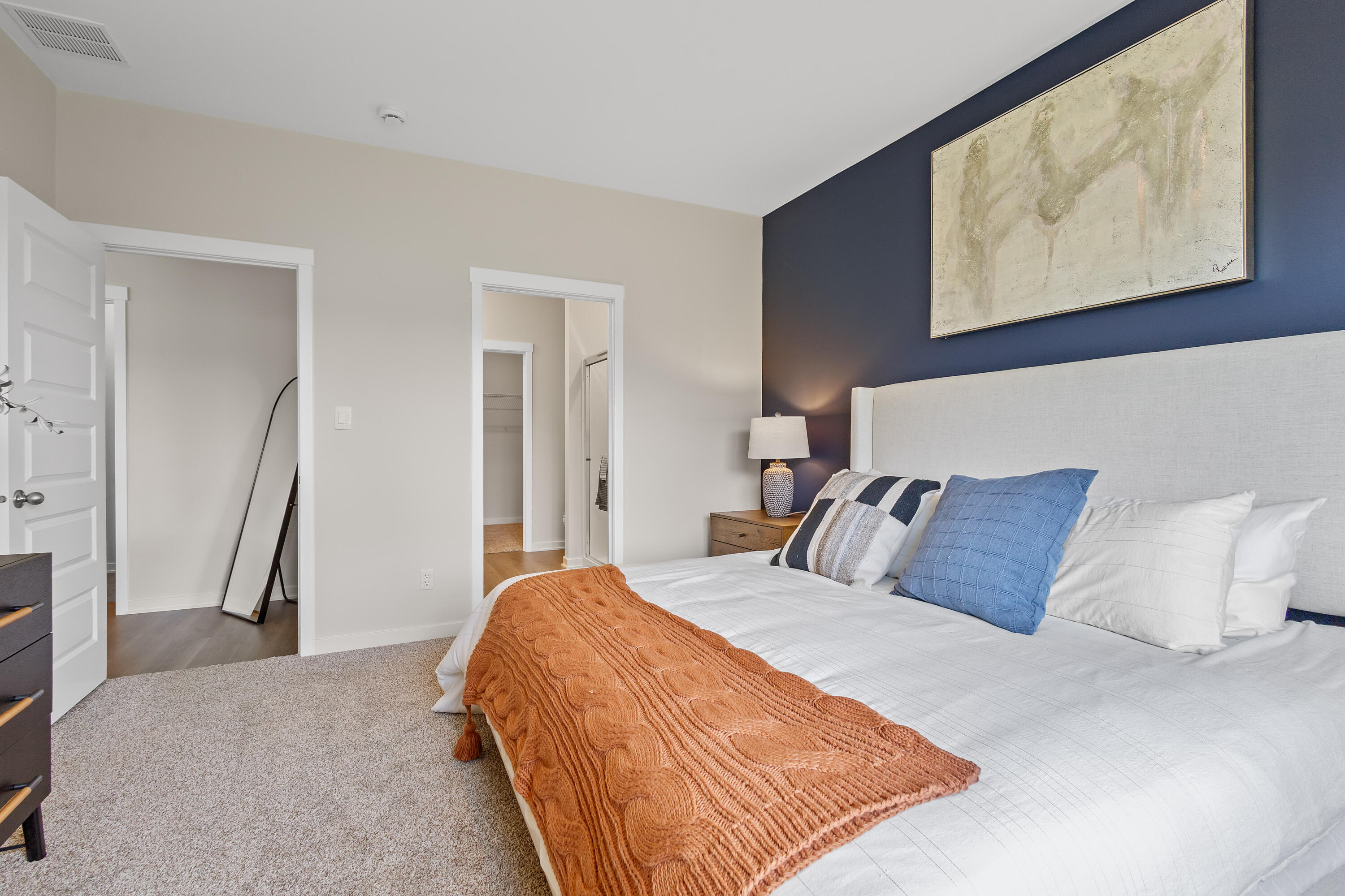 445 Bricker Street Hebron, IN 46341 - Photo 13 of 24 a bedroom with a bed and wall painting