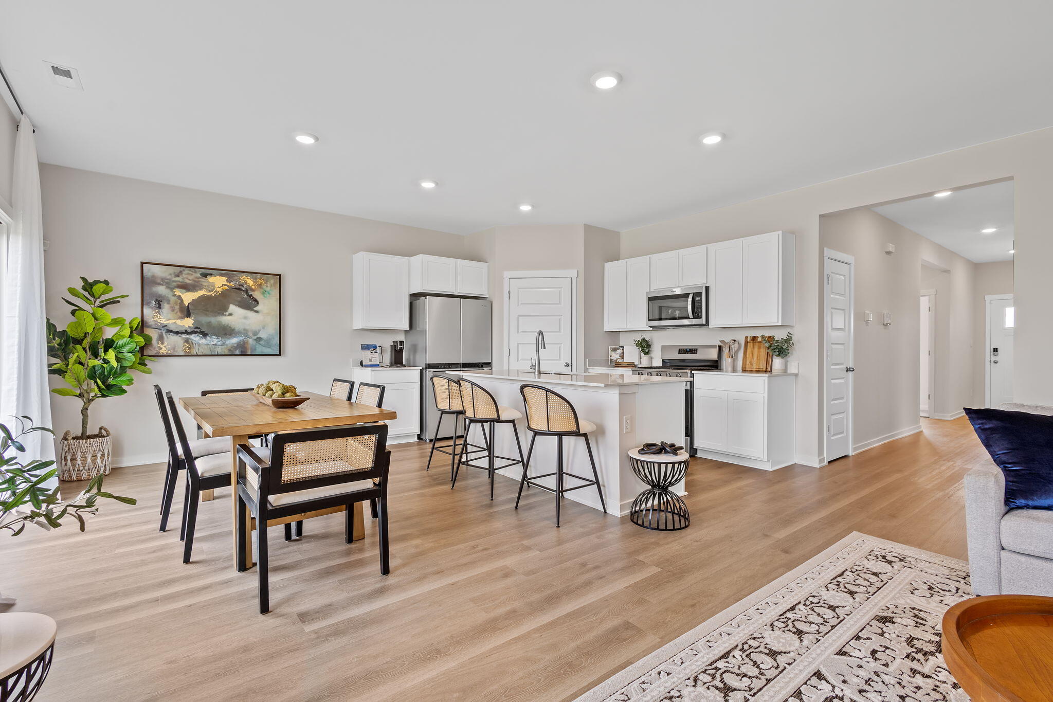 445 Bricker Street Hebron, IN 46341 - Photo 6 of 24 a living room with furniture and kitchen view