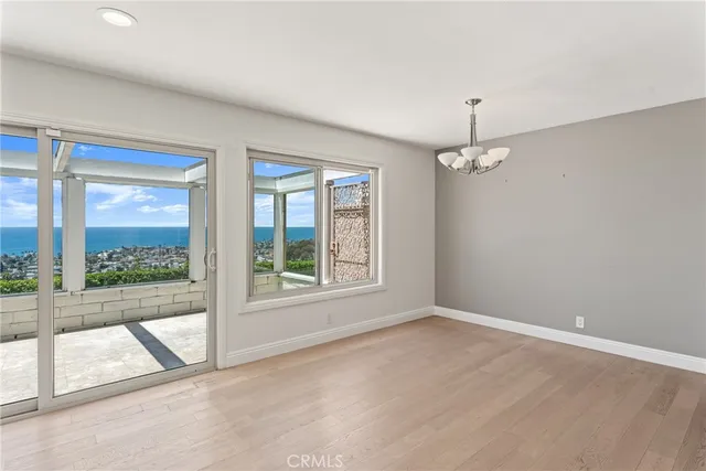 a view of a kitchen with a sink and a fireplace