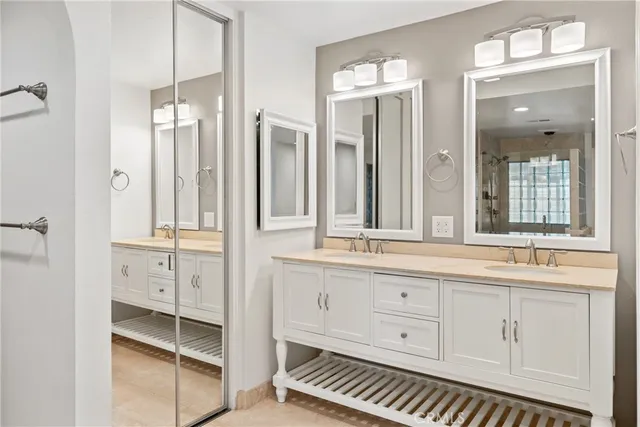 a bathroom with a bathtub sink and shower