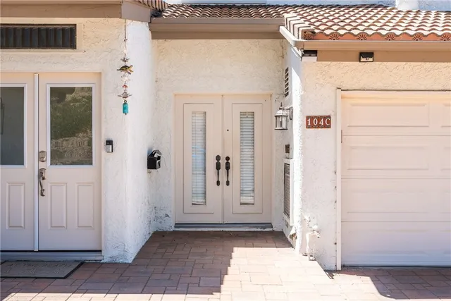 a view of a entryway door of the house