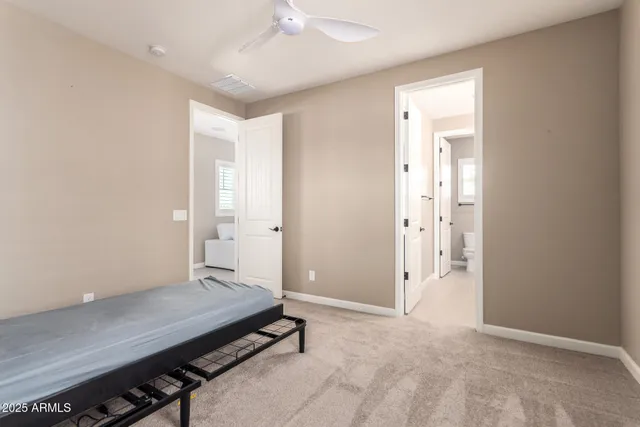 an empty room with closet area