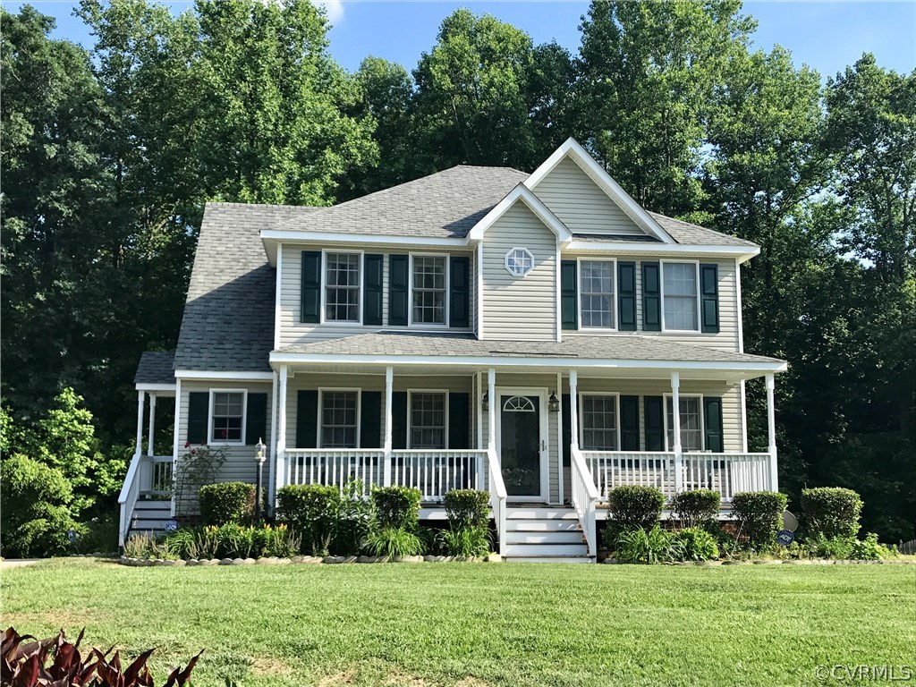 5409 Takach Road Prince George, VA 23875 - Photo 1 of 26 a front view of a house with a yard