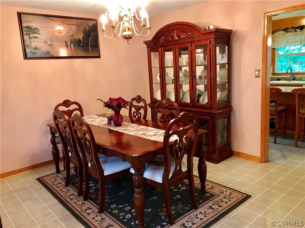 5409 Takach Road Prince George, VA 23875 - Photo 16 of 26 a view of a dining room with furniture