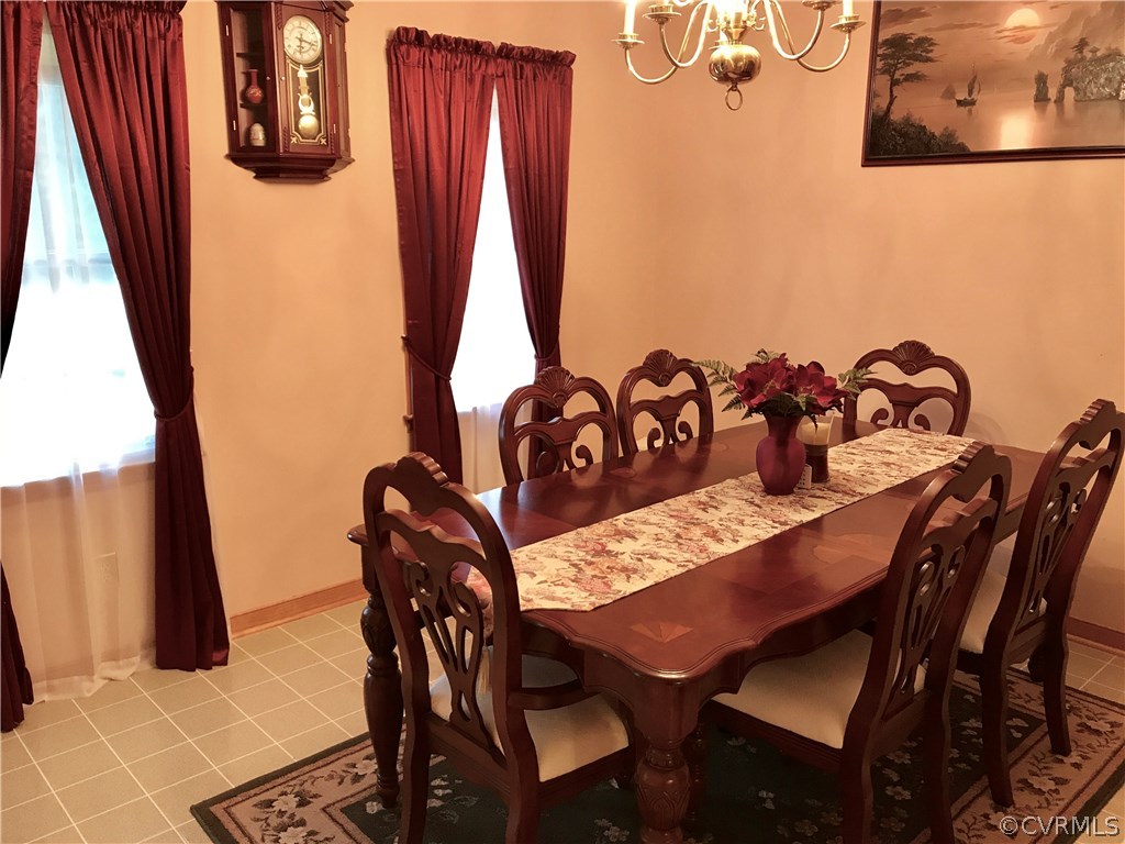 5409 Takach Road Prince George, VA 23875 - Photo 17 of 26 a view of a dining room with furniture and wooden floor