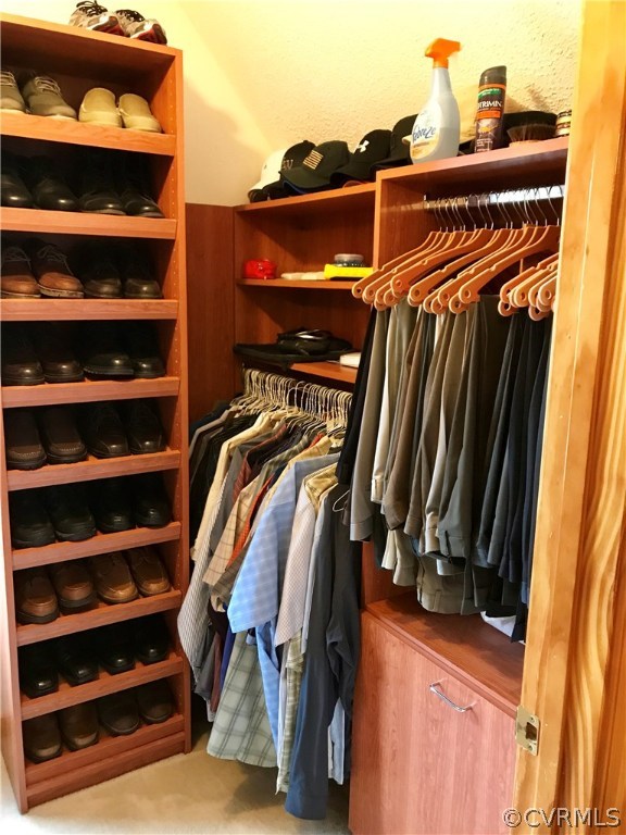 5409 Takach Road Prince George, VA 23875 - Photo 20 of 26 a view of walk in closet with clothes and shoes