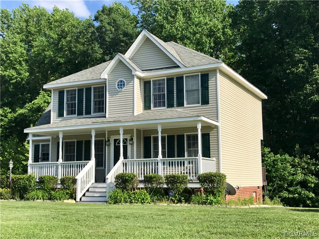 5409 Takach Road Prince George, VA 23875 - Photo 4 of 26 a front view of a house with a yard