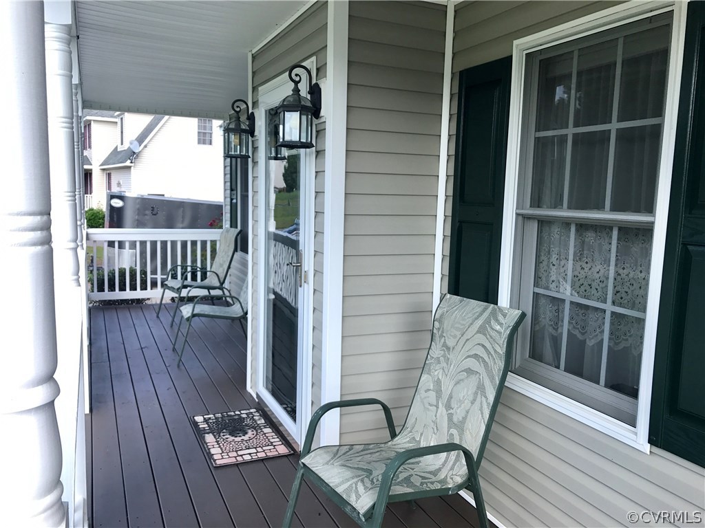 5409 Takach Road Prince George, VA 23875 - Photo 6 of 26 a view of balcony and wooden floor