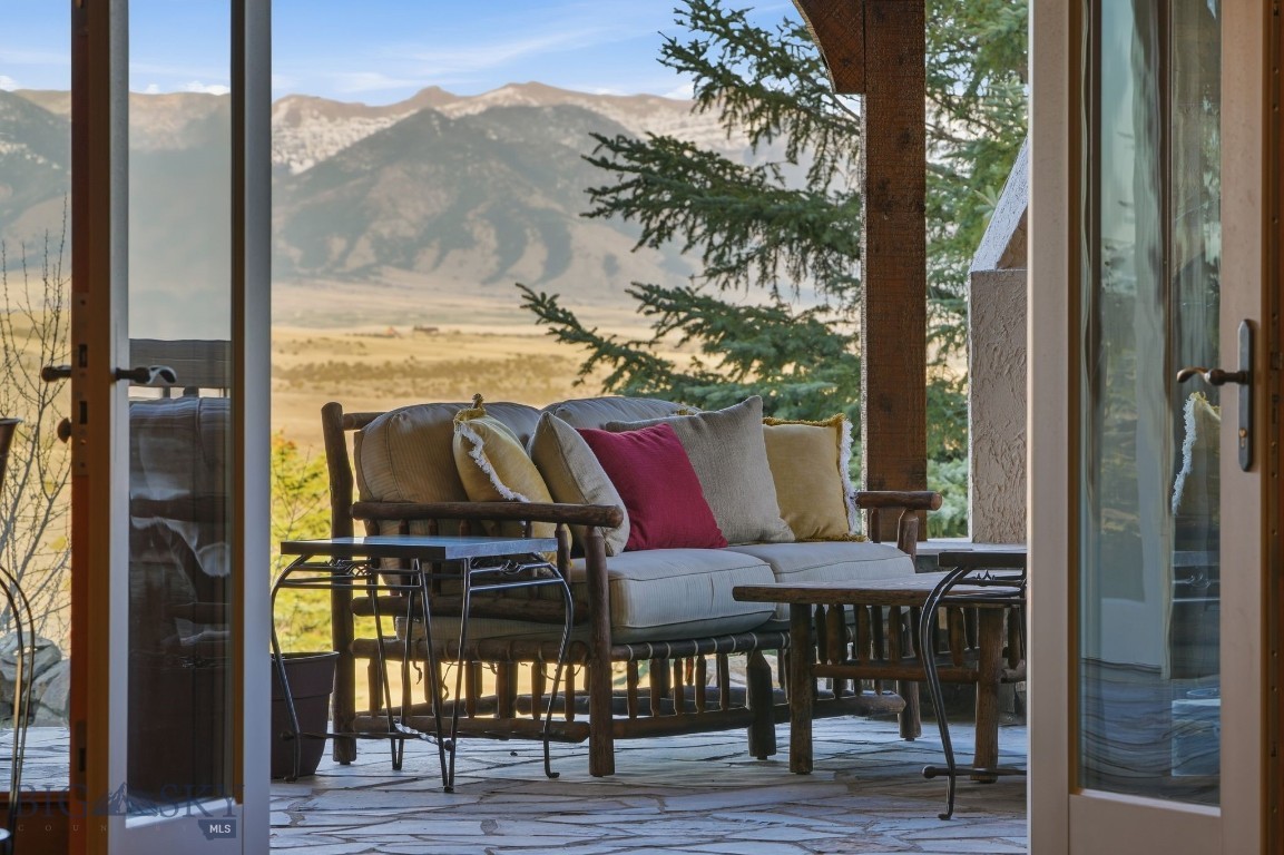 1240 Twin River Cutoff Road Manhattan, MT 59741 - Photo 21 of 88 Inviting outdoor living space with stunning mountain views