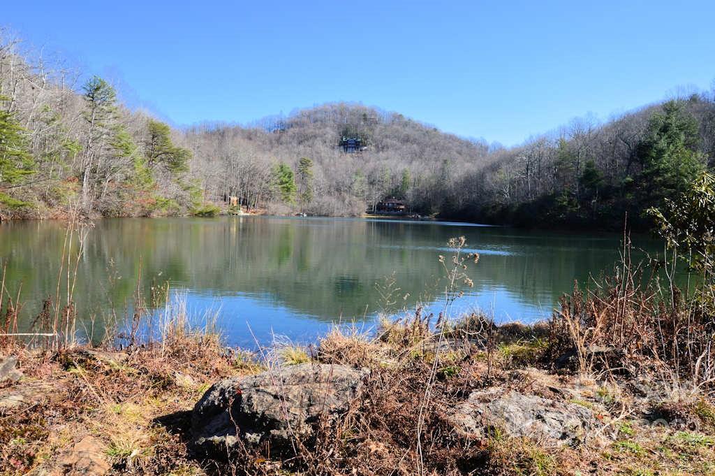 0 Melrose Mountain Road, Unit 513 Tryon, NC 28782 - Photo 7 of 7 a view of a lake with a mountain in the background
