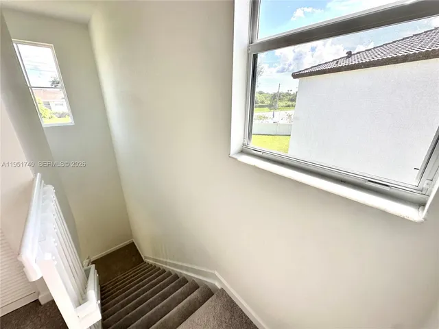 a view of an entryway with a window