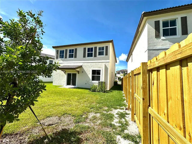 a front view of house with yard