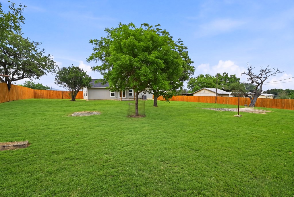 150 Oak Ridge Dr Center Point Center Point, TX 78010 - Photo 13 of 13 a view of green field with tree in the background