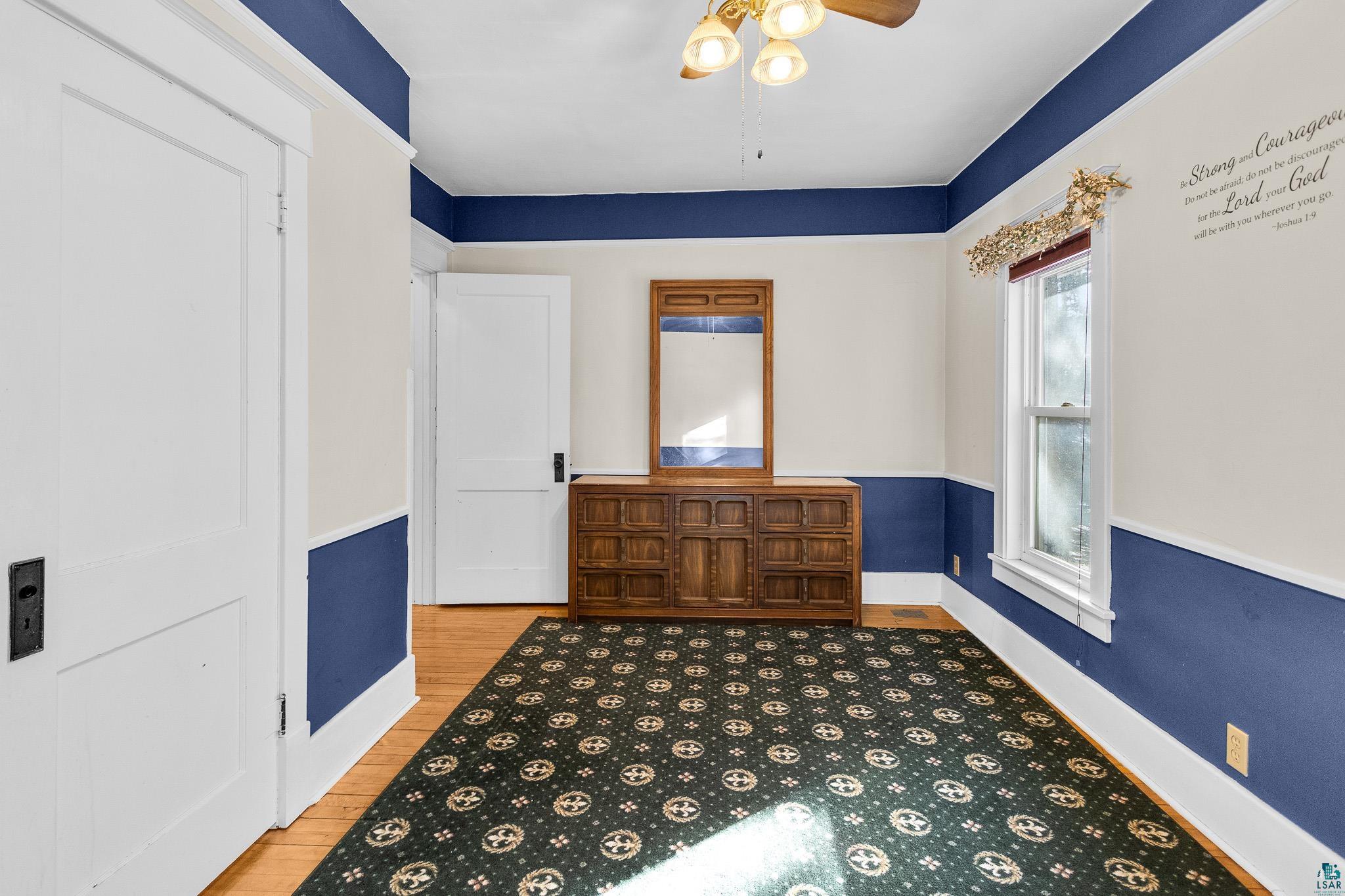 6494 School Street Finlayson, MN 55735 - Photo 17 of 31 Unfurnished room with ceiling fan and light wood-style flooring