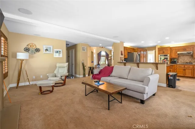 a living room with furniture and a couch