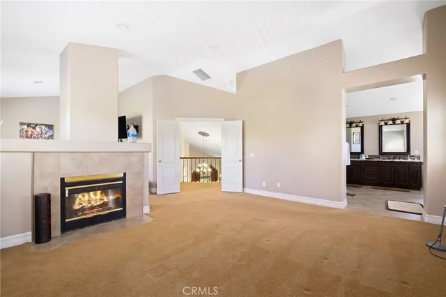 a view of a livingroom with a fireplace