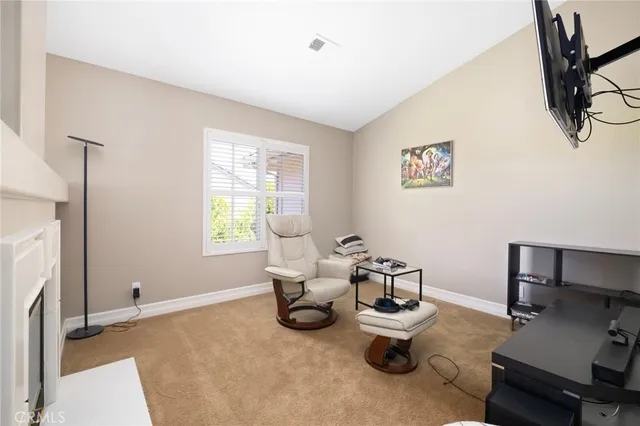 a room with furniture and a window