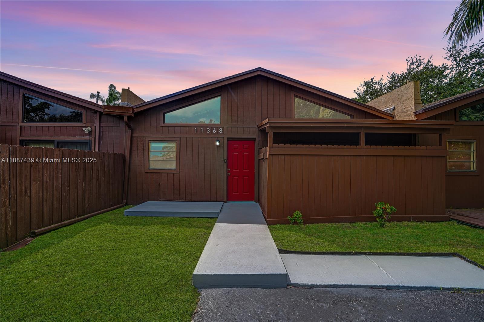 a front view of house with yard