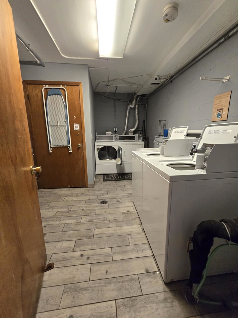 1101 Harlem Avenue, Unit 203 Oak Park, IL 60130 - Photo 18 of 58 a room with a washing machine and sink