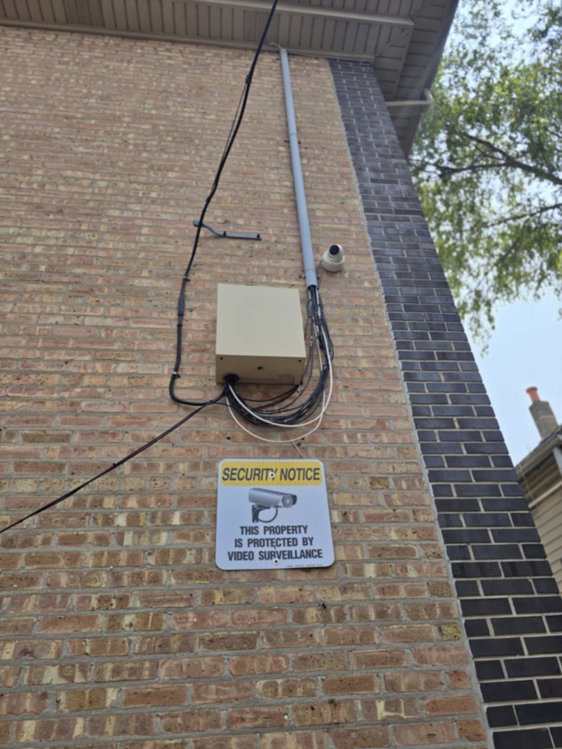 1101 Harlem Avenue, Unit 203 Oak Park, IL 60130 - Photo 23 of 58 a sign on a brick wall