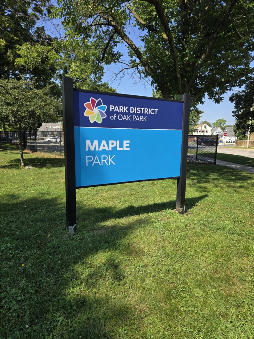 1101 Harlem Avenue, Unit 203 Oak Park, IL 60130 - Photo 29 of 58 a sign that is sitting in the grass