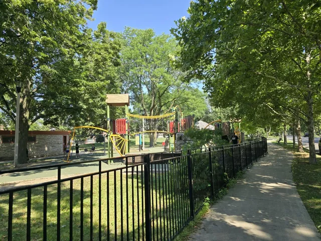 a view of outdoor space with garden and trees