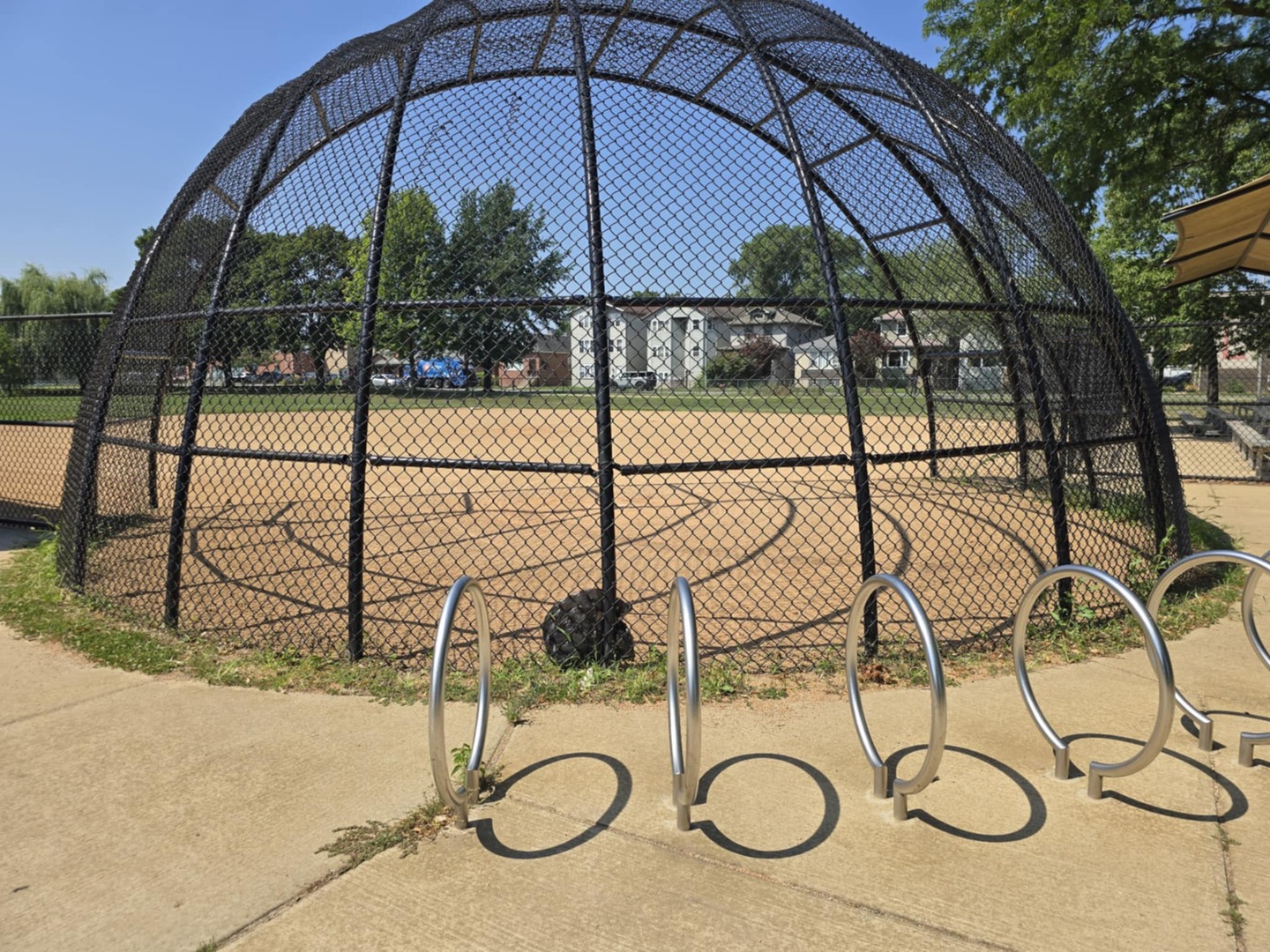 1101 Harlem Avenue, Unit 203 Oak Park, IL 60130 - Photo 31 of 58 a table with table and chairs under an umbrella